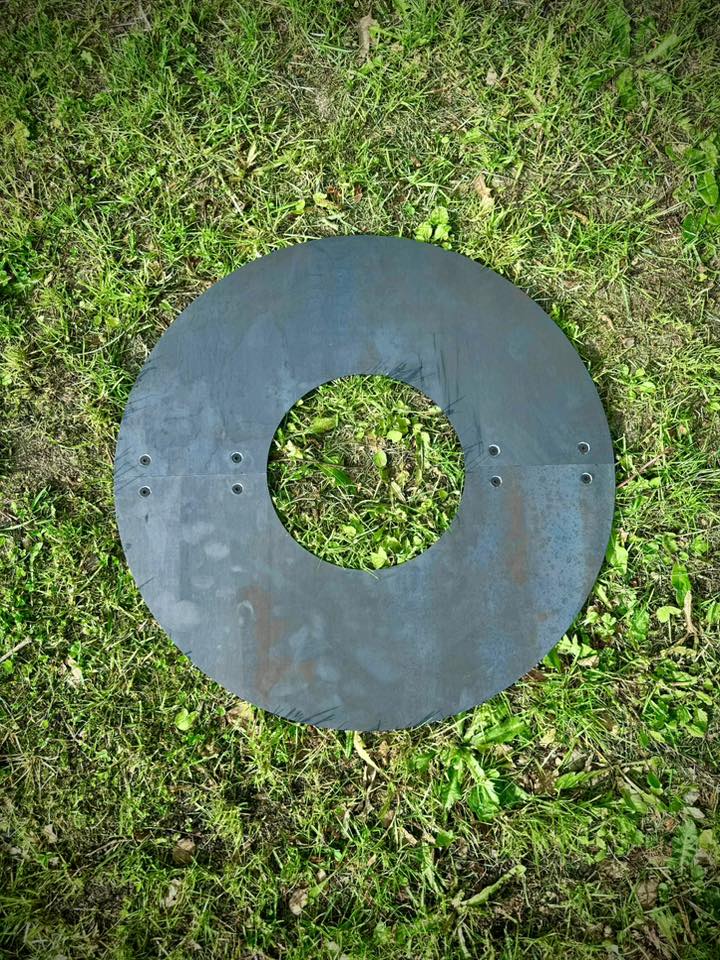 Cortenstål ring til robotklipper i bymiljø
